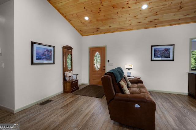 living room featuring high vaulted ceiling, light hardwood / wood-style floors, and wooden ceiling