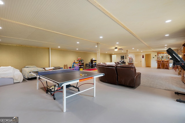 game room featuring concrete flooring