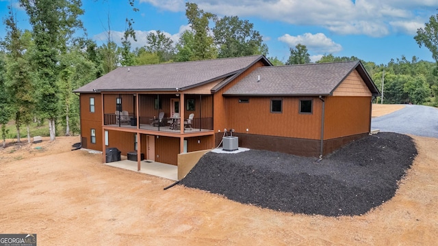 rear view of house with a patio