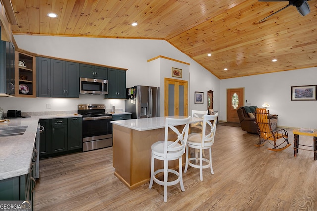 1581 Taylor Town Rd NE, Ranger, GA 30734 - kitchen with appliances with stainless steel finishes, wooden ceiling, high vaulted ceiling, light wood-type flooring, and a breakfast bar area