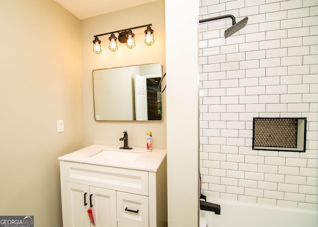 bathroom with tub / shower combination and vanity