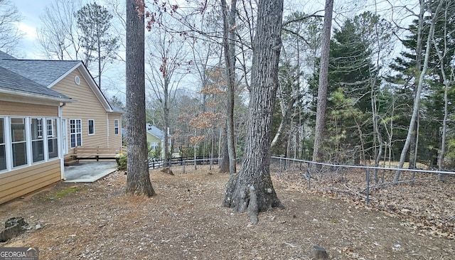 view of yard with a deck