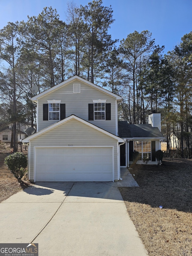 view of front of home with a garage