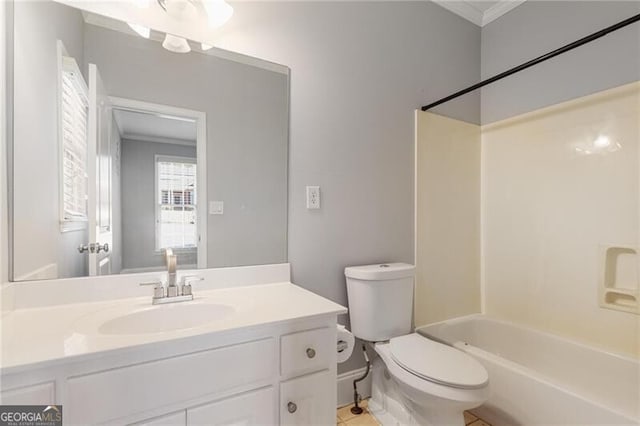 full bathroom with crown molding, vanity, toilet, and  shower combination