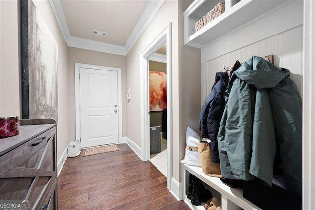 mudroom with crown molding and dark hardwood / wood-style flooring