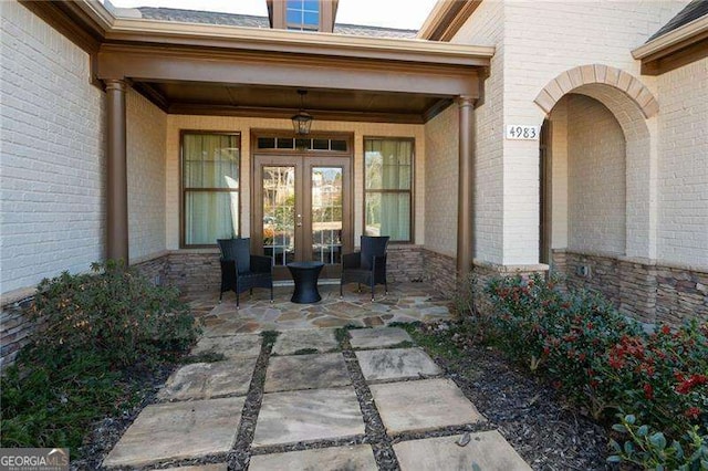 doorway to property featuring french doors