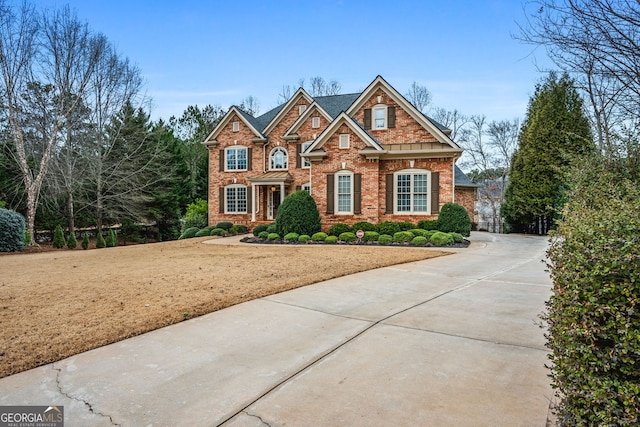 craftsman-style home with a front lawn