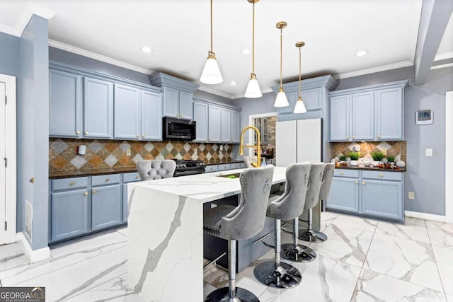 kitchen with pendant lighting, sink, appliances with stainless steel finishes, light stone counters, and ornamental molding