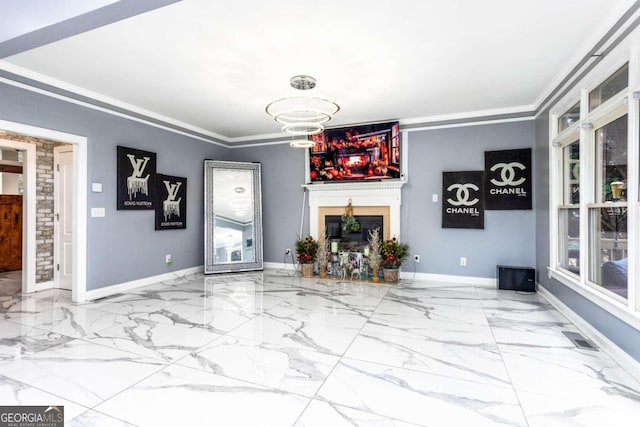 unfurnished living room featuring an inviting chandelier and crown molding