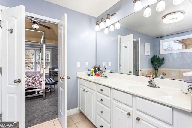 bathroom with tile patterned flooring and vanity