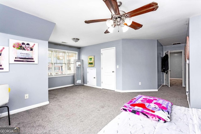 bedroom with ceiling fan and carpet floors