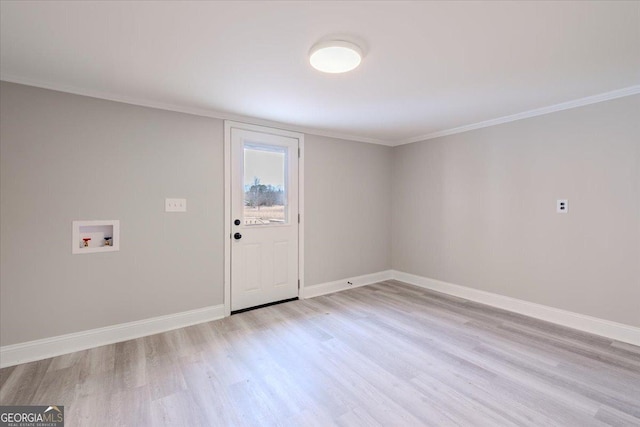 interior space with crown molding and light hardwood / wood-style flooring