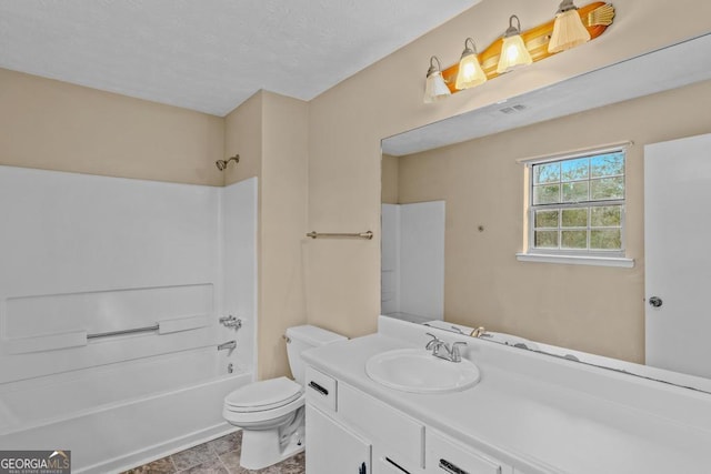 full bathroom featuring vanity,  shower combination, and toilet