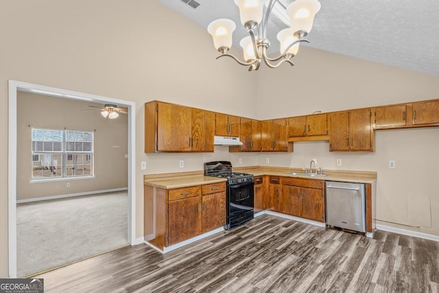 kitchen with black range with gas cooktop, sink, high vaulted ceiling, hanging light fixtures, and stainless steel dishwasher