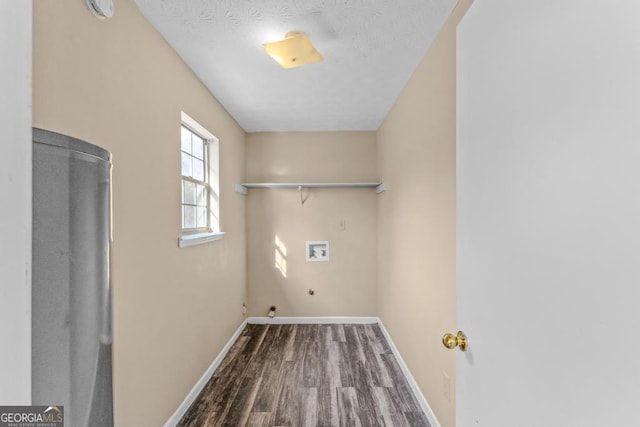 laundry area featuring gas dryer hookup, washer hookup, and hardwood / wood-style flooring