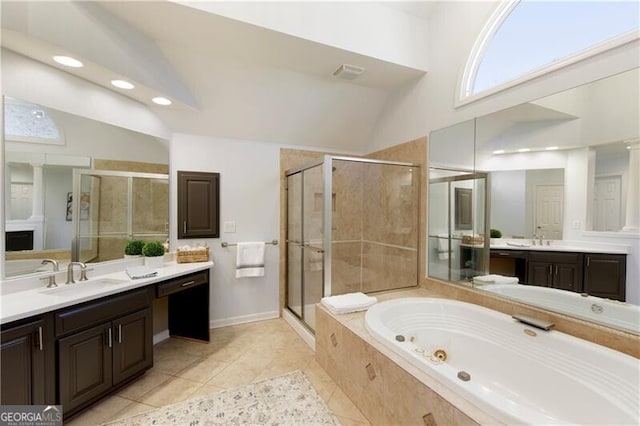 bathroom with vanity, tile patterned flooring, high vaulted ceiling, and separate shower and tub