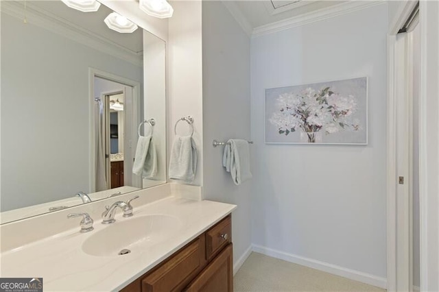 bathroom with vanity and ornamental molding