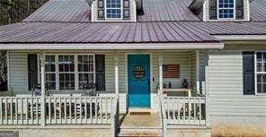 view of front of home featuring covered porch