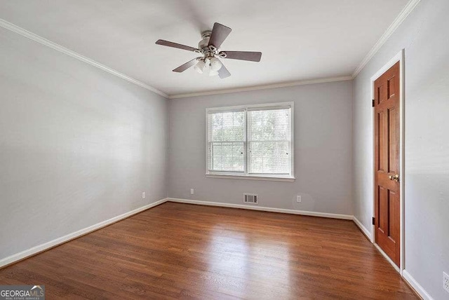 unfurnished room with wood-type flooring, ornamental molding, and ceiling fan