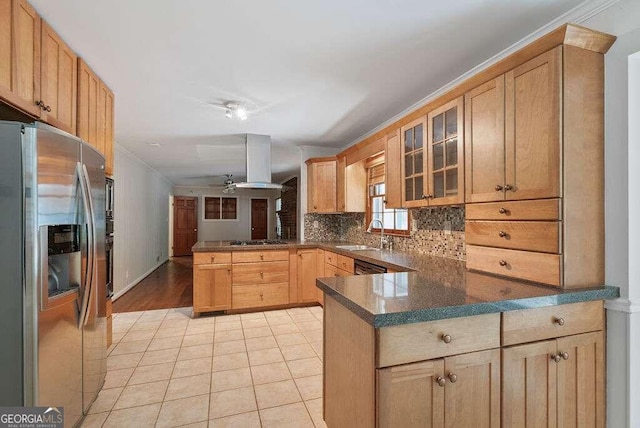 kitchen with sink, backsplash, stainless steel refrigerator with ice dispenser, island exhaust hood, and kitchen peninsula