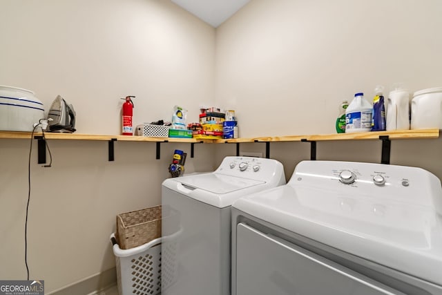 laundry room with washer and dryer