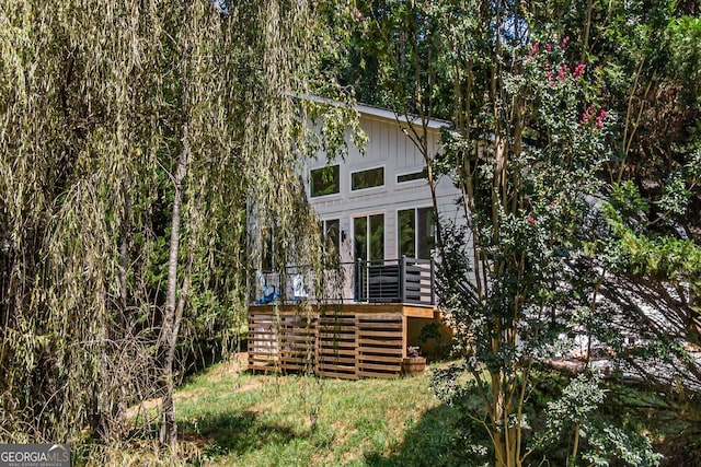 82 Circle Dr, Morganton, GA 30560 - back of house with a deck, stairway, and board and batten siding