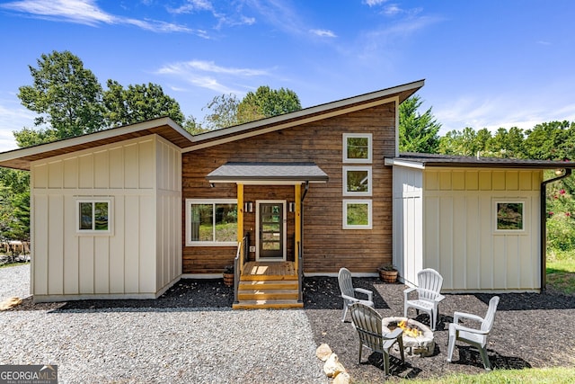 82 Circle Dr, Morganton, GA 30560 - view of front of home featuring board and batten siding and a fire pit