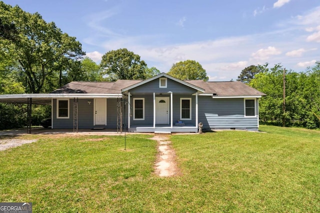 ranch-style house featuring a porch, a carport, and a front lawn