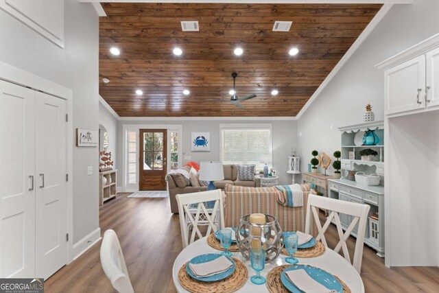1471 River Rd, Townsend, GA 31331 - dining space with wooden ceiling, ornamental molding, and vaulted ceiling