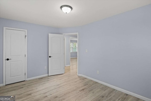 unfurnished bedroom featuring light hardwood / wood-style floors