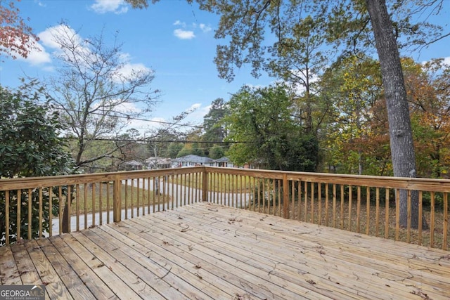 wooden terrace with a water view