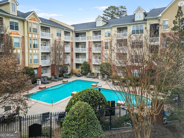 view of pool featuring a patio