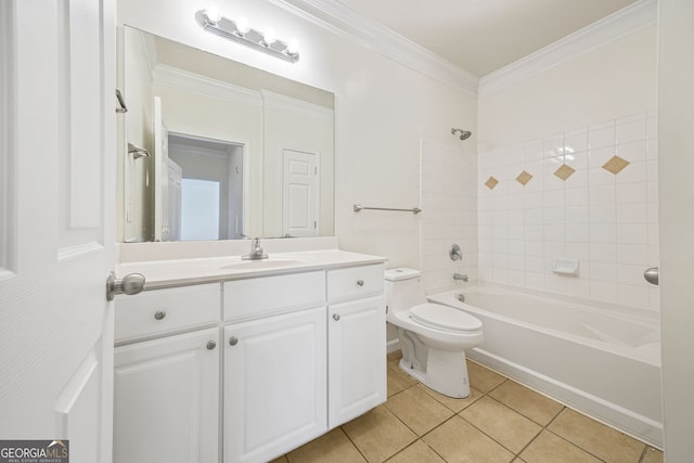 full bathroom with tiled shower / bath combo, vanity, toilet, crown molding, and tile patterned floors