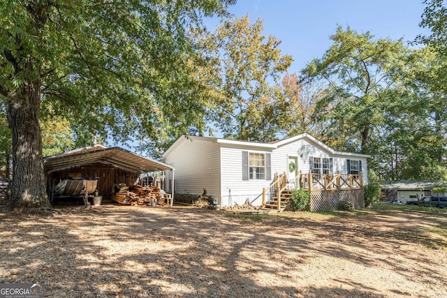 view of front facade with a carport