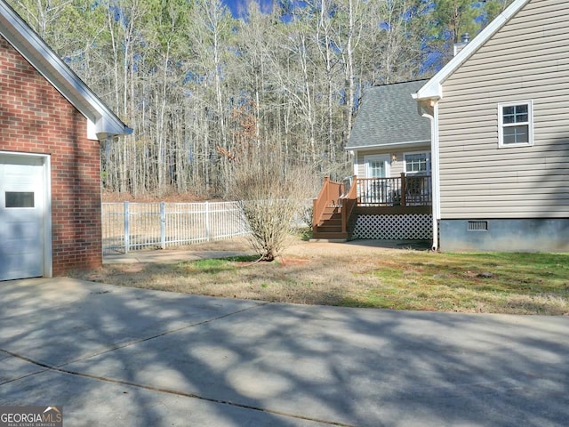 view of yard featuring a deck