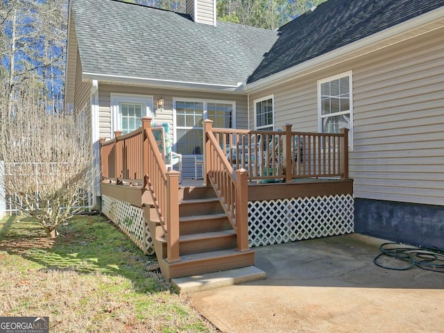 wooden deck featuring a patio area