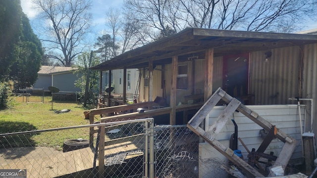 view of outdoor structure featuring a lawn