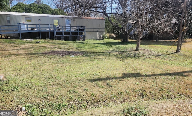 view of yard featuring a deck