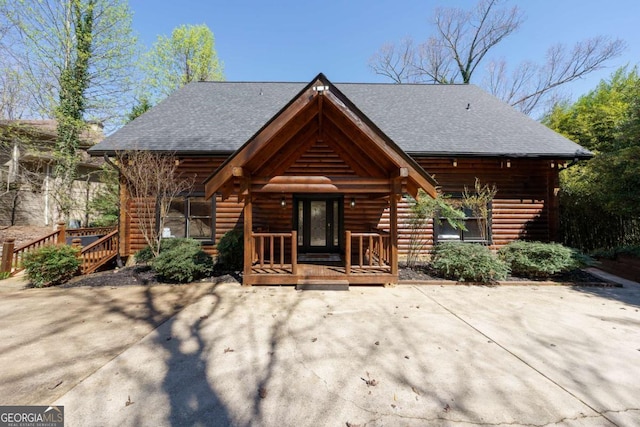 view of log cabin