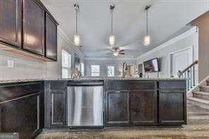 bar featuring ornamental molding, dark brown cabinets, stainless steel dishwasher, and ceiling fan