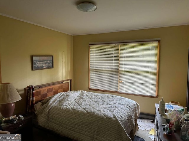 bedroom featuring crown molding