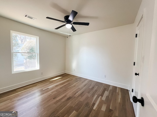 empty room featuring wood-type flooring and ceiling fan