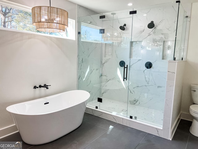 bathroom with shower with separate bathtub and toilet