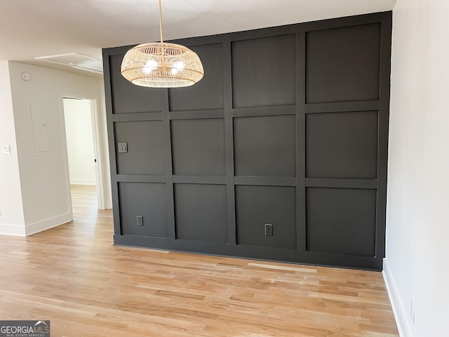 unfurnished dining area featuring light hardwood / wood-style floors