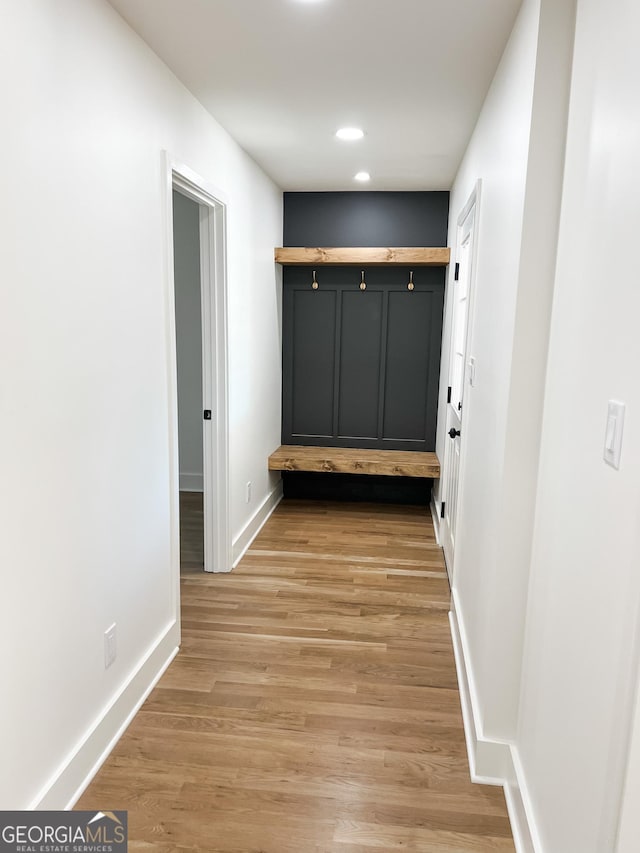 corridor featuring light wood-type flooring