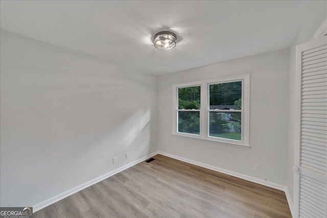 unfurnished bedroom with light hardwood / wood-style flooring