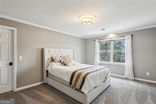 bedroom featuring crown molding and carpet floors