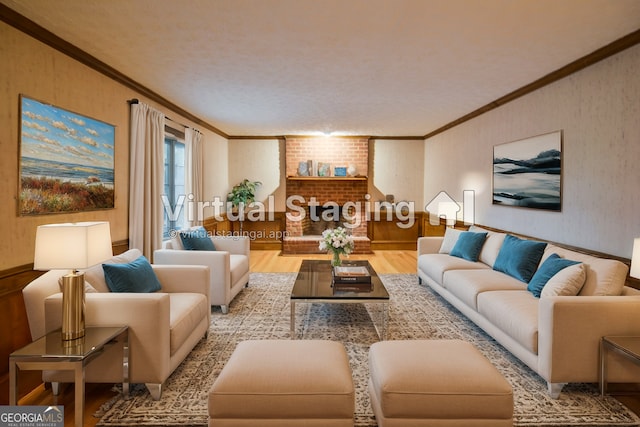 living room with crown molding, a fireplace, and light hardwood / wood-style floors