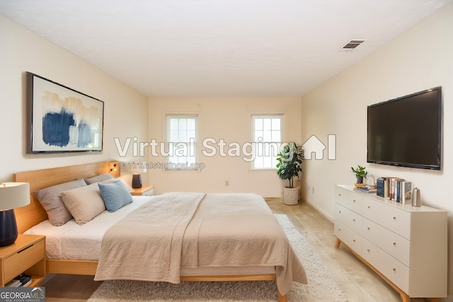 bedroom featuring light hardwood / wood-style flooring