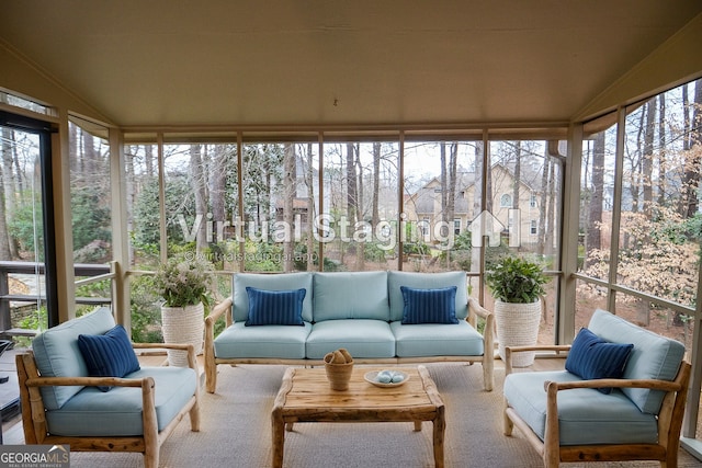 sunroom with lofted ceiling